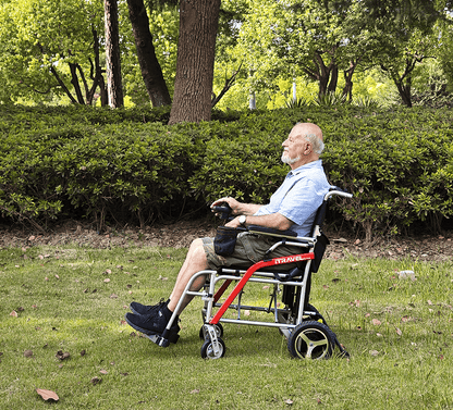 White folding electric wheelchair.